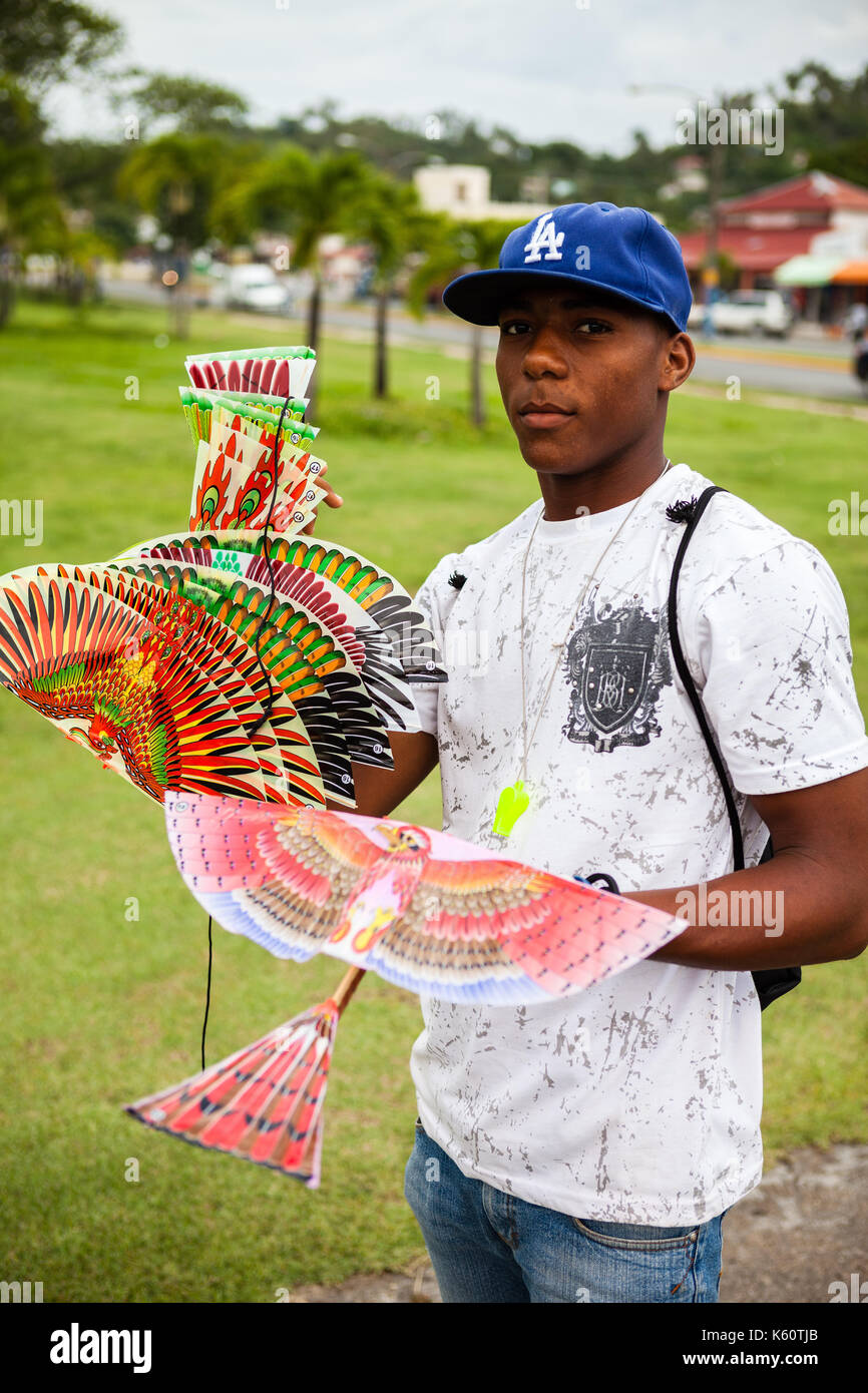 Young men showing a plastic plane Stock Photo