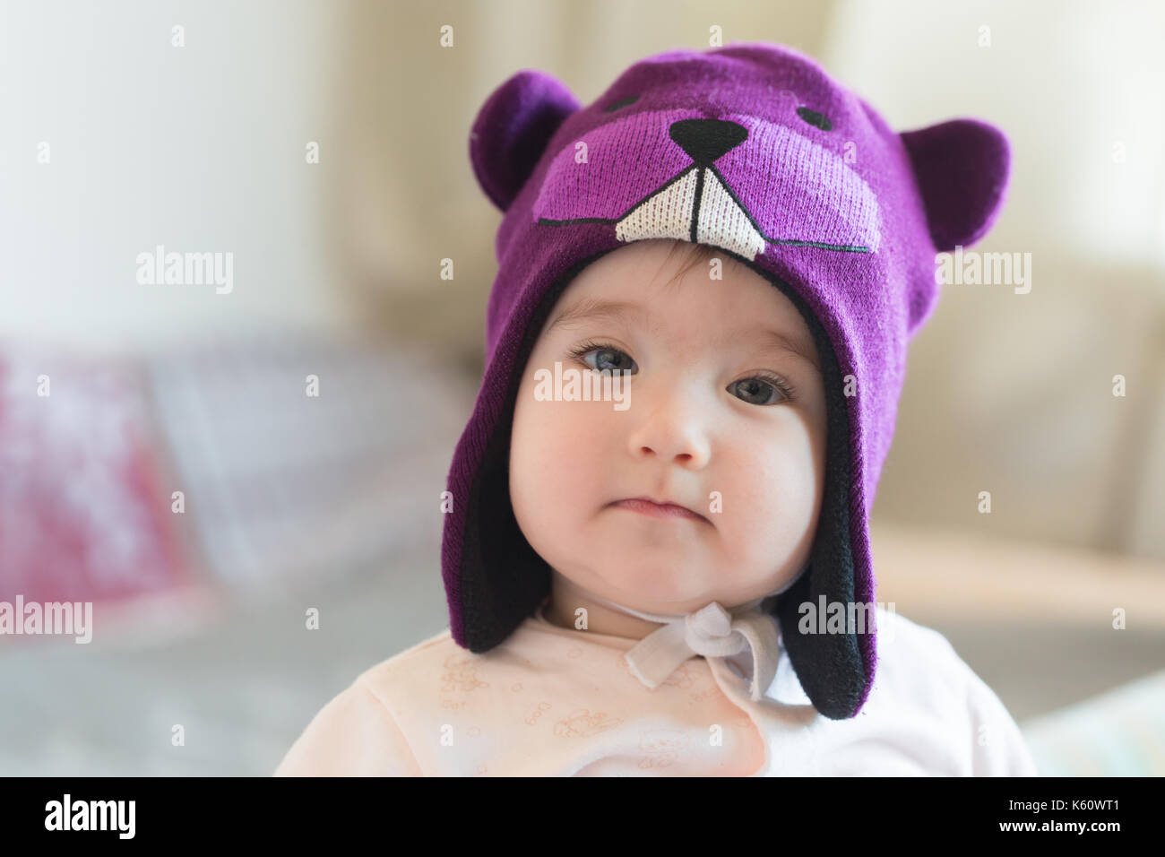 Little child in a beaver cap close up portrait. Stock Photo