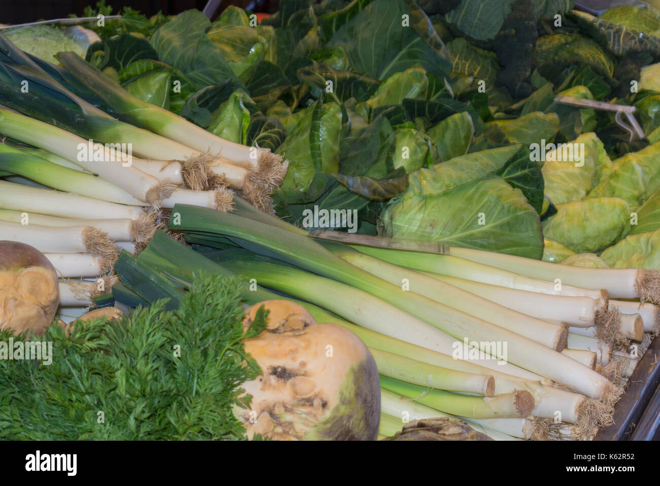 Fresh green vegetables for sale at supermarket Stock Photo