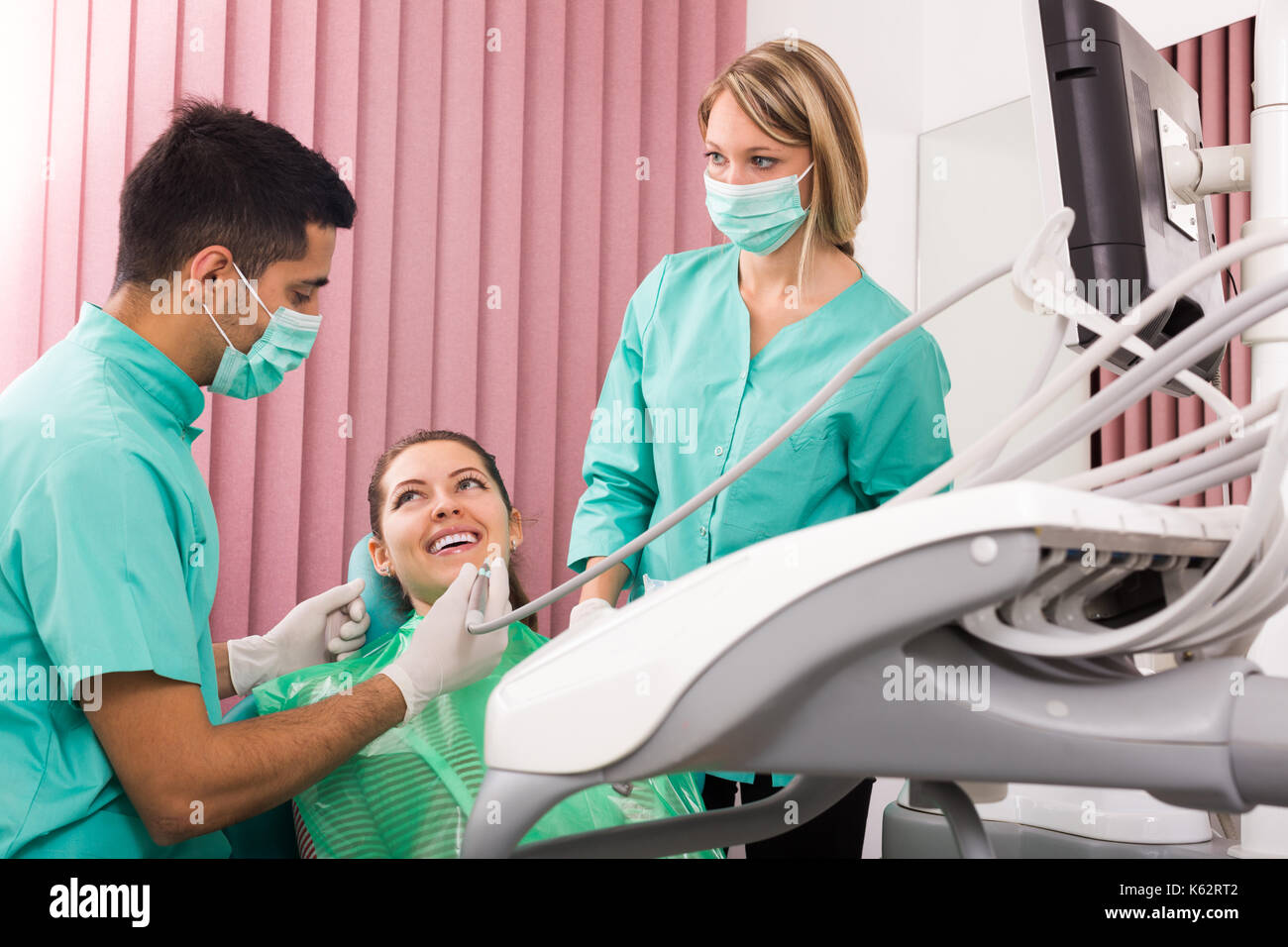Portrait of dentist and russian patient at dental clinic Stock Photo