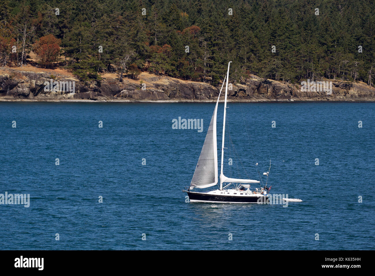 Sailing boat in the Salish Sea between the Gulf Islands at Vancouver Island, British Columbia, Canada. Stock Photo