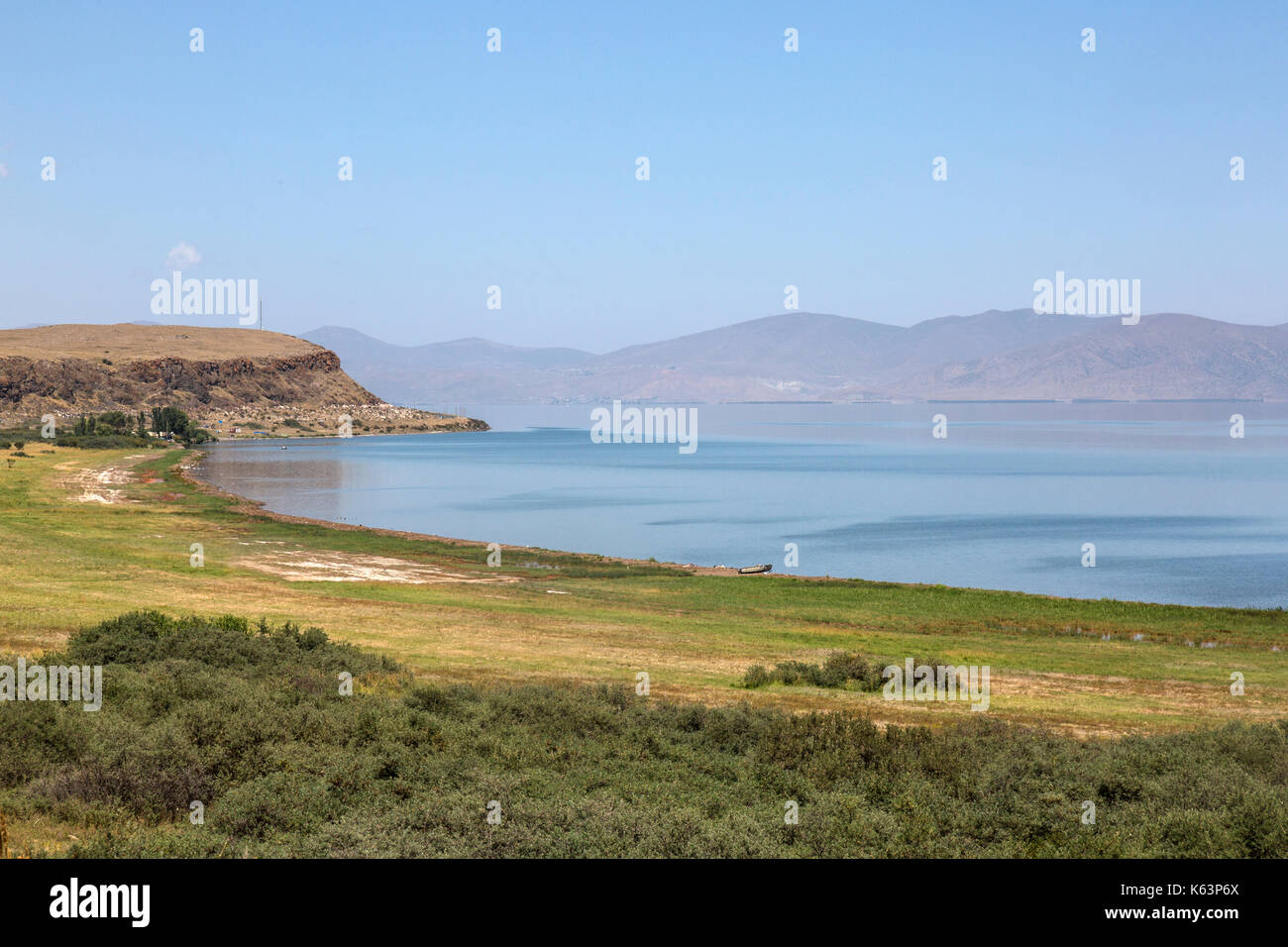 Shores of Lake Sevan in Armenia.The lake is situated in Gegharkunik Province, at an altitude of 1,900 m (6,234 ft) above sea level. Stock Photo