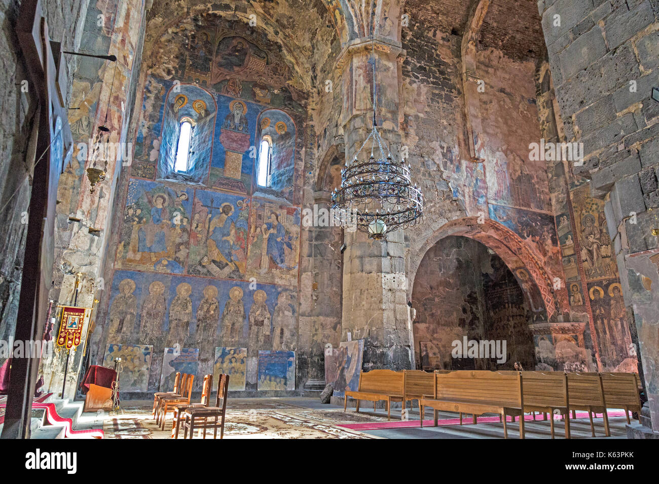 Inside the Akhtala Monastery in Armenia, showing paintings, icons, and the architecture of the building. Stock Photo