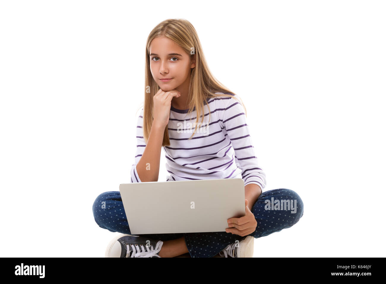 Teen girl legs crossed floor hi-res stock photography and images - Alamy