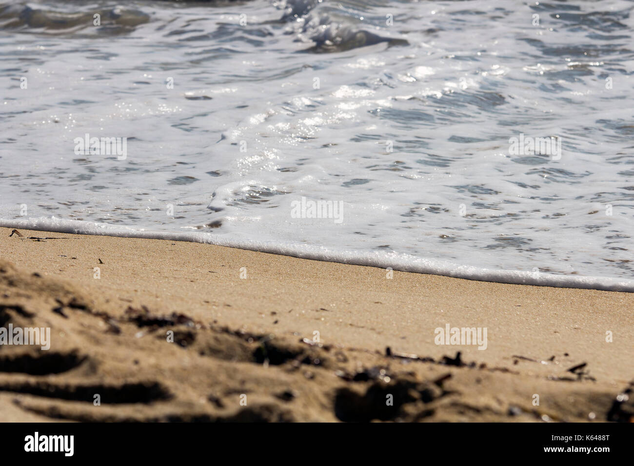 Gangle Wave Gentle wave on beach hi-res stock photography and images - Alamy