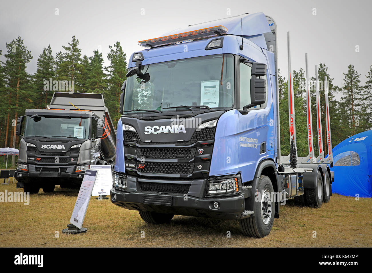 HYVINKAA, FINLAND - SEPTEMBER 8, 2017: Scania Suomi Oy presents the new Scania XT range, R650 for wood transport and G450 for construction, on Maxpo 2 Stock Photo