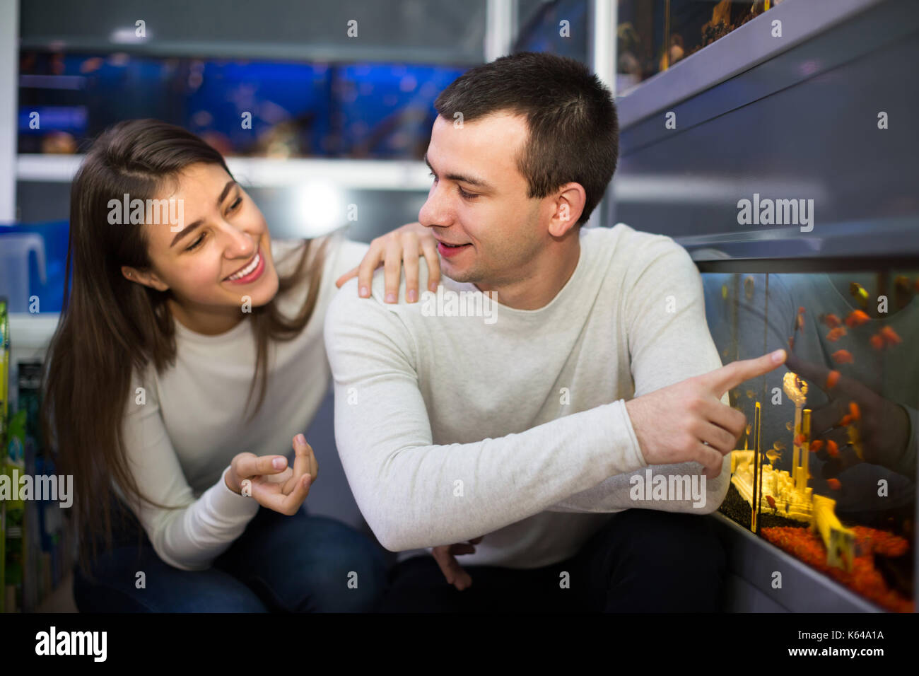 Aquarium home person hi-res stock photography and images - Alamy