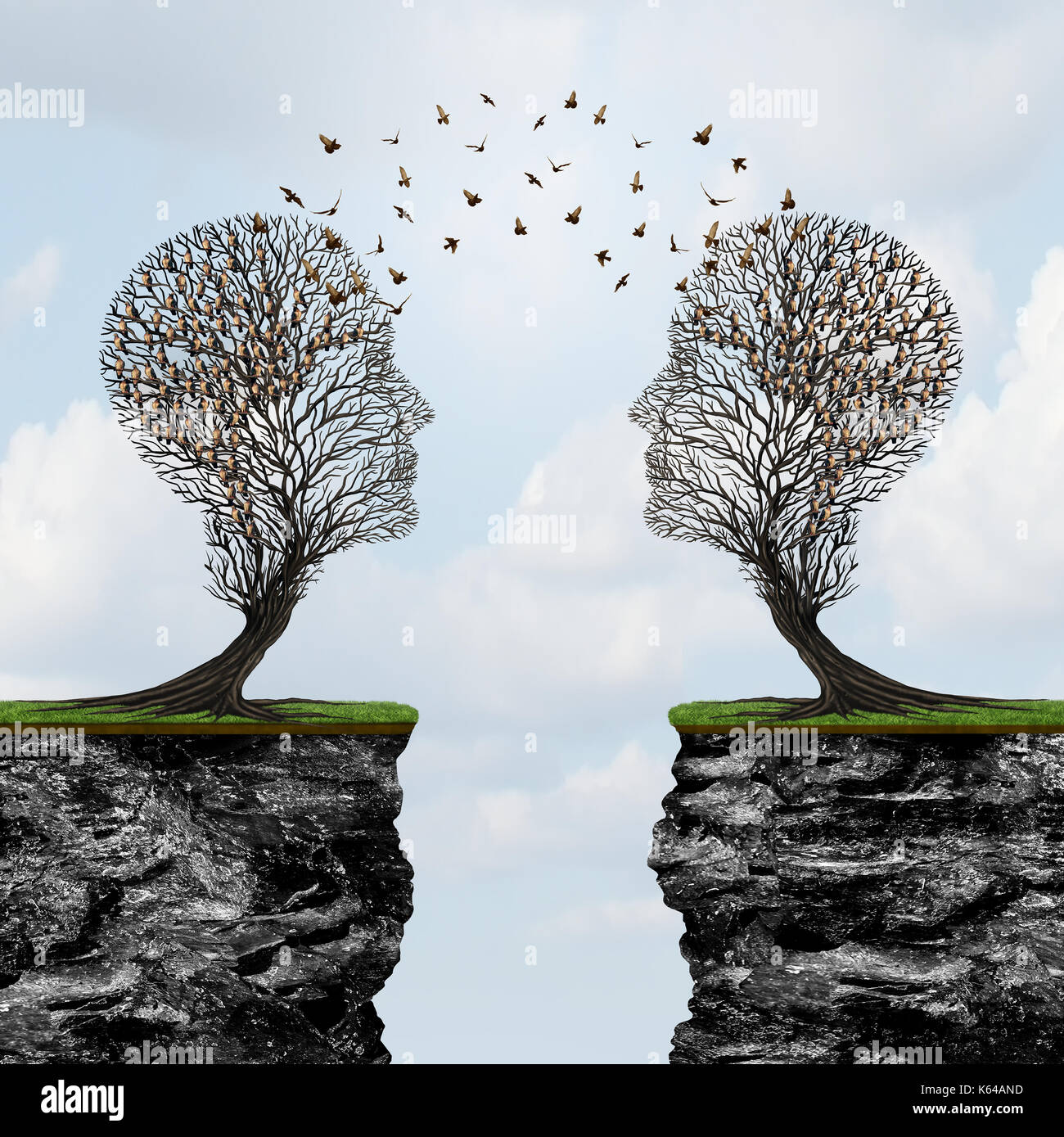 Communicating from distance as two trees shaped as a human head with birds in transit across cliffs as a business metaphor for commerce reach. Stock Photo