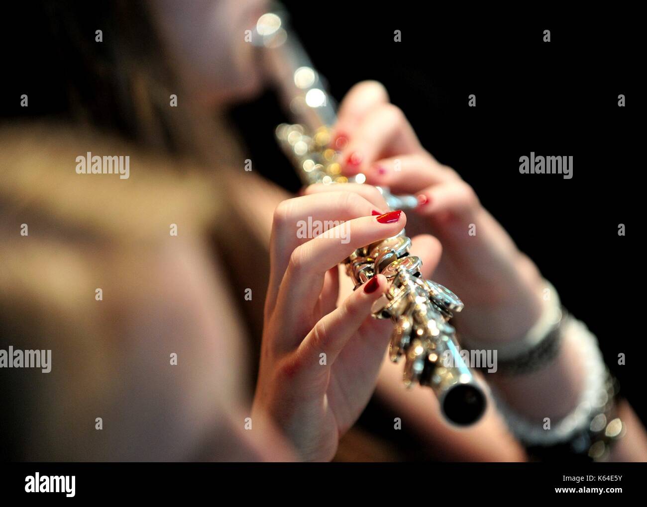 Oldenburg, Germany. 04th July, 2012. A young woman plays a transverse flute during a school concert in Oldenburg (Germany), 04 July 2012. | usage worldwide Credit: dpa/Alamy Live News Stock Photo