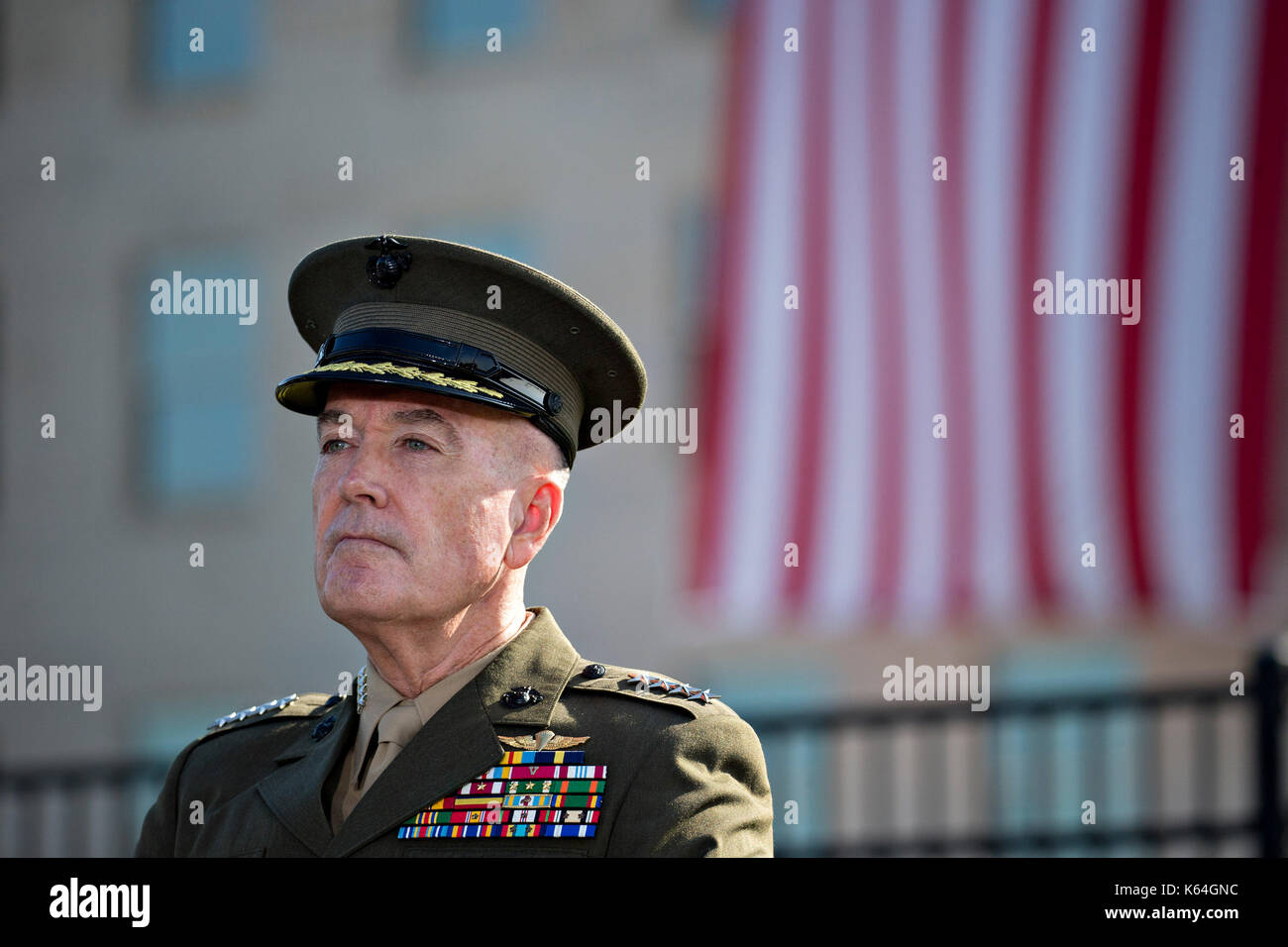 General Joseph Dunford, Chairman of the Joint Chiefs of Staff, listens during a ceremony to commemorate the September 11, 2001 terrorist attacks with U.S. President Donald Trump, not pictured, at the Pentagon in Washington, D.C., U.S., on Monday, Sept. 11, 2017. Trump is presiding over his first 9/11 commemoration on the 16th anniversary of the terrorist attacks that killed nearly 3,000 people when hijackers flew commercial airplanes into New York's World Trade Center, the Pentagon and a field near Shanksville, Pennsylvania.  Credit: Andrew Harrer / Pool via CNP /MediaPunch Stock Photo