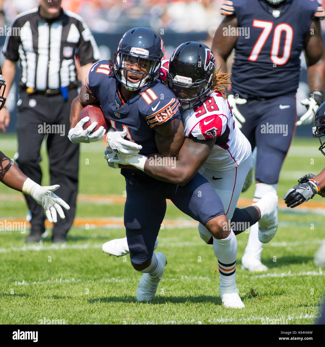 Chicago, Illinois, USA. 10th Sep, 2017. - Chicago Bears #11 Kevin White gets tackled from behind by Atlanta Falcons #98 Takkarist McKinley resulting in White's broken left collarbone during the NFL Game between the Atlanta Falcons and Chicago Bears at Soldier Field in Chicago, IL. Credit: csm/Alamy Live News Stock Photo