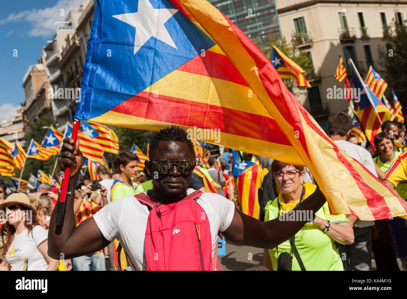 Barcelona, Catalonia. 11th Sep, 2017. Spain. September 11th, 2017. Hundreds of miles of people arriving from all over Catalonia are manifested in Barcelona on the National Day of Catalonia, to demand the right to vote for the creation of a new Mediterranean nation. Credit: Charlie Perez/Alamy Live News Stock Photo