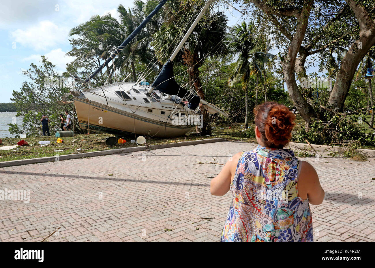 Miami, Florida, USA. 11th Sep, 2017. A sailboat came to rest near a parking lot off of Dinner Key in Miami after Hurricane Irma. Credit: Sun-Sentinel/ZUMA Wire/Alamy Live News Stock Photo