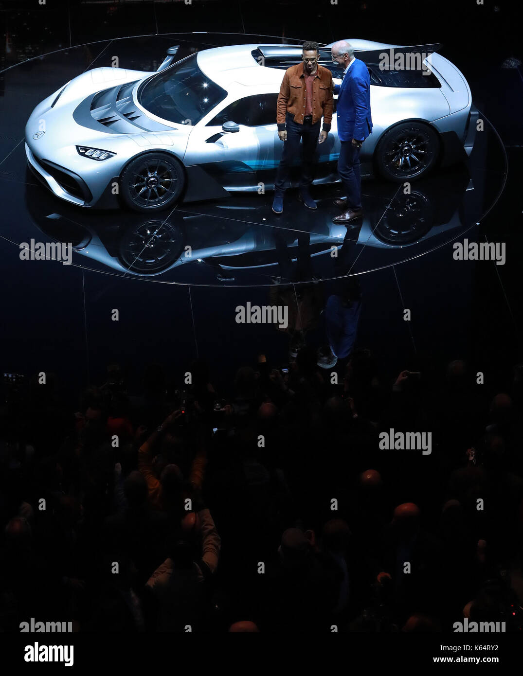 Frankfurt, Germany. 11th Sep, 2017. Dieter Zetsche (R), chairman of German car maker Daimler AG and head of Mercedes-Benz cars, and Mercedes' British driver Lewis Hamilton pose in front of a Mercedes AMG Project One car during a preview night for the media on the eve of the opening of the Internationale Automobil Ausstellung (IAA) motor show in Frankfurt am Main, west Germany, on Sept. 11, 2017. Credit: Luo Huanhuan/Xinhua/Alamy Live News Stock Photo