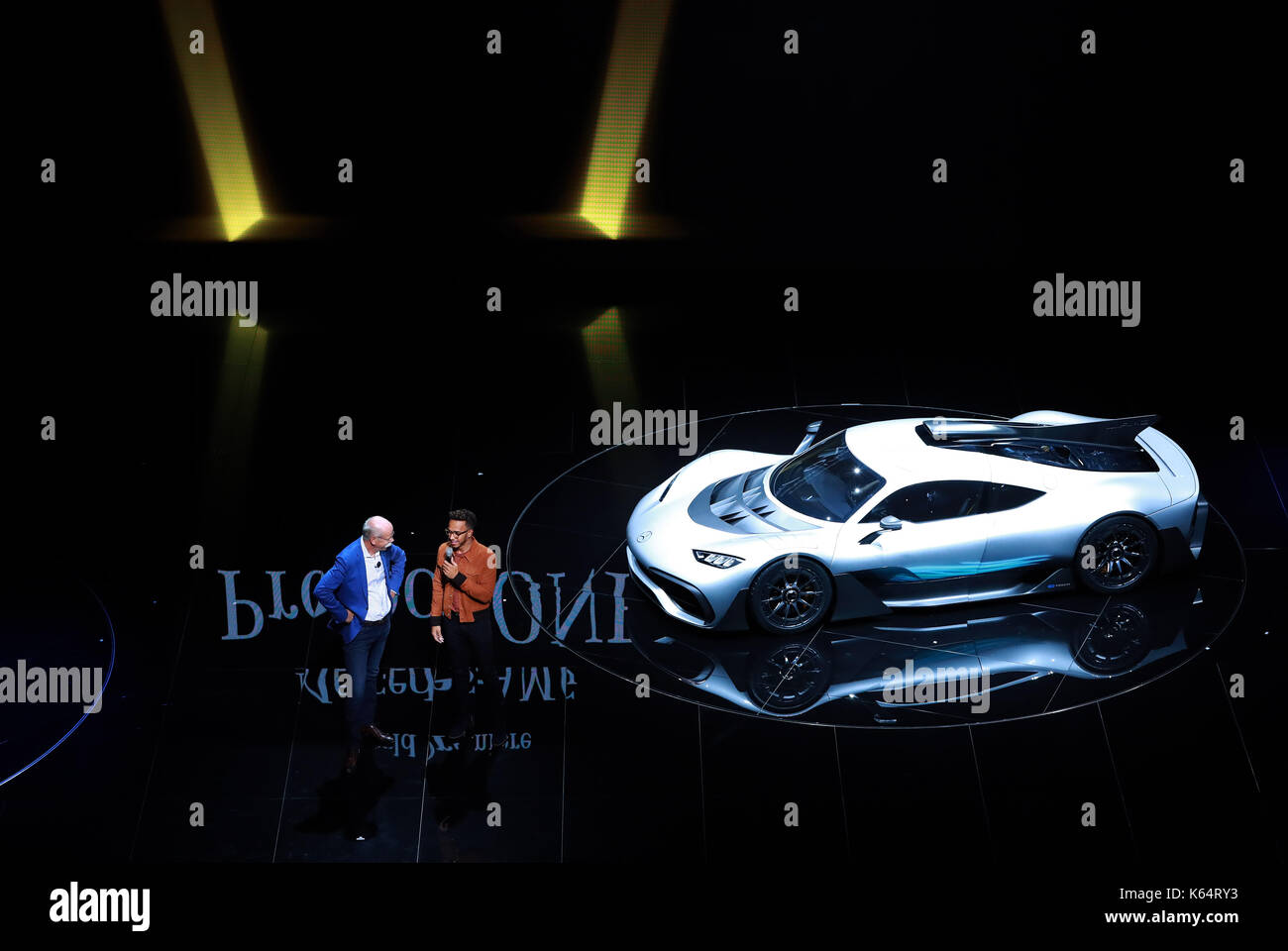 Frankfurt, Germany. 11th Sep, 2017. Dieter Zetsche (L), chairman of German car maker Daimler AG and head of Mercedes-Benz cars, and Mercedes' British driver Lewis Hamilton pose in front of a Mercedes AMG Project One car during a preview night for the media on the eve of the opening of the Internationale Automobil Ausstellung (IAA) motor show in Frankfurt am Main, west Germany, on Sept. 11, 2017. Credit: Luo Huanhuan/Xinhua/Alamy Live News Stock Photo