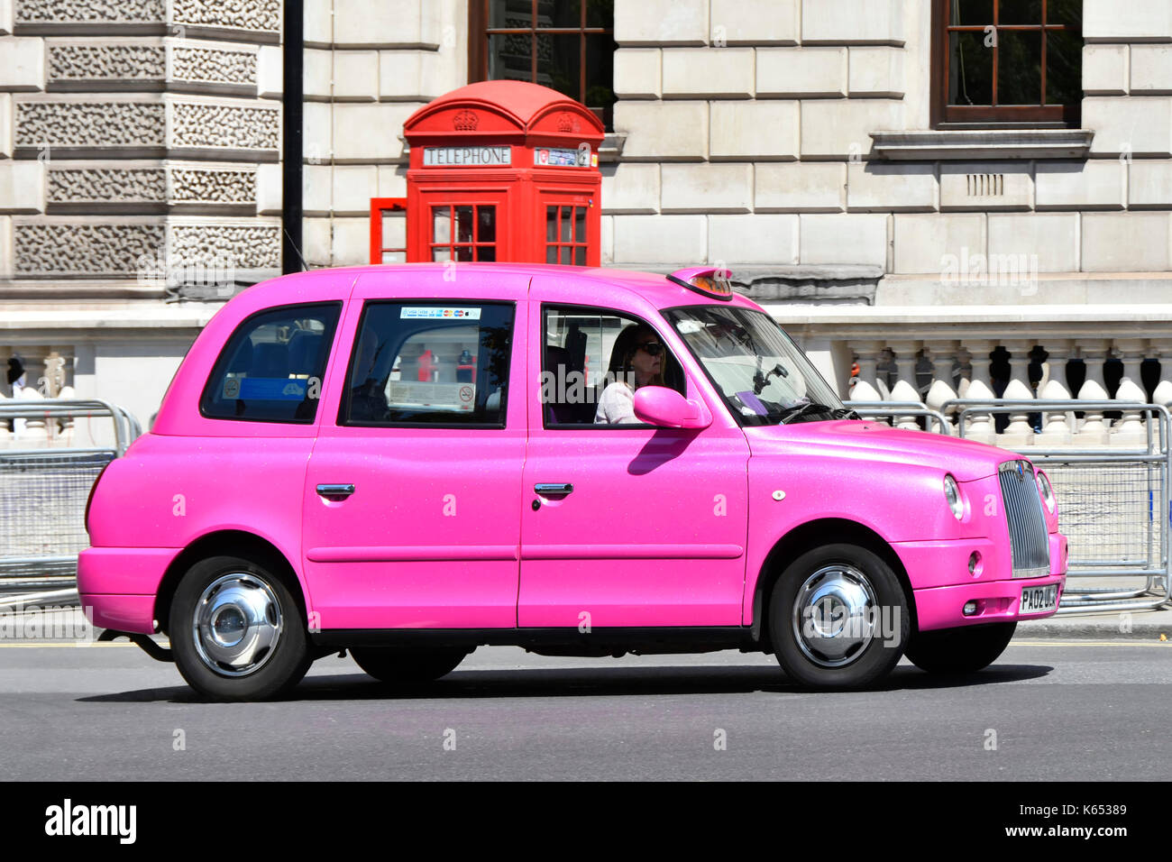 Pink taxi uk hi-res stock photography and images - Alamy