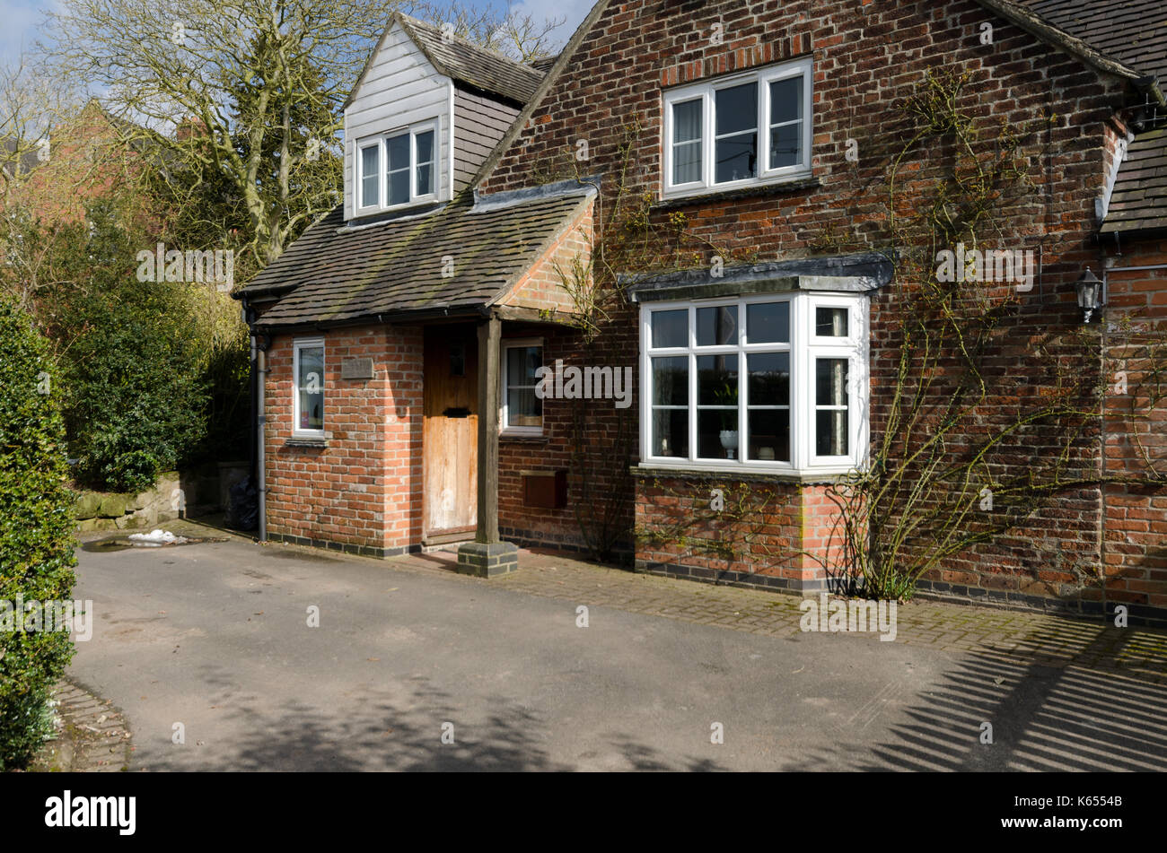 Front porch and bay window of Derbyshire cottage Stock Photo
