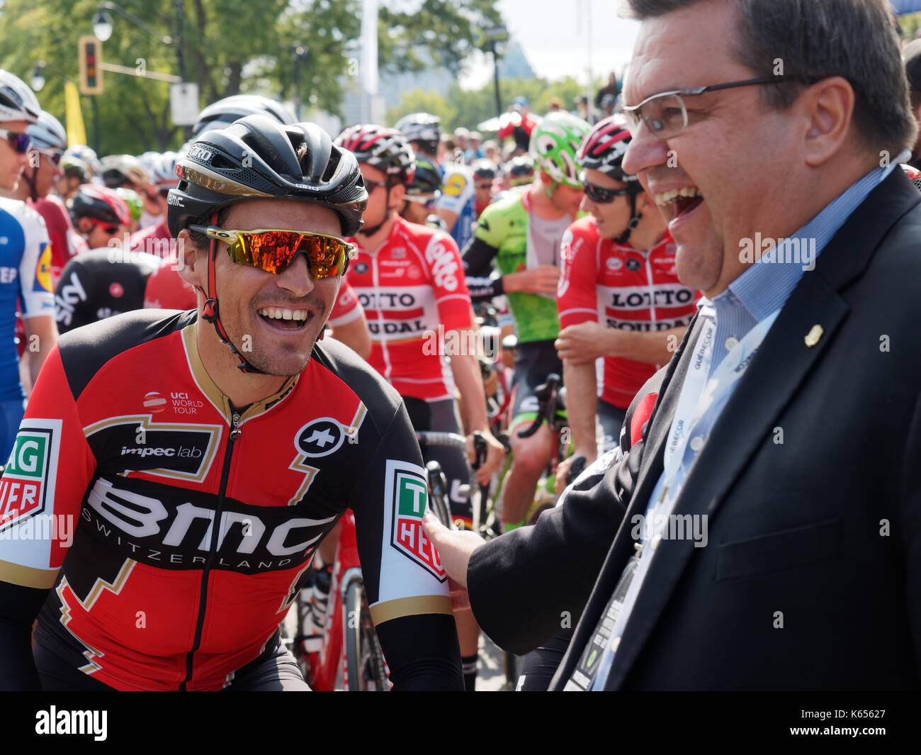Montreal, Canada. 10/09/2017. Greg Van Avermaet chats with the mayor of Montreal Denis Coderre at the start line of the Grand Prix Cycliste race in Mo Stock Photo