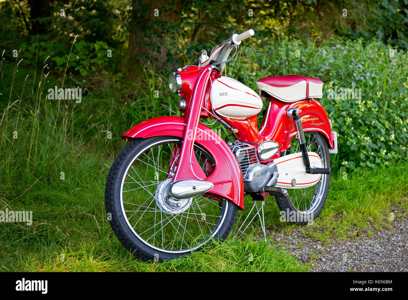 An immaculate old DKW moped parked on a woodland track in Bavaria, Germany. Stock Photo