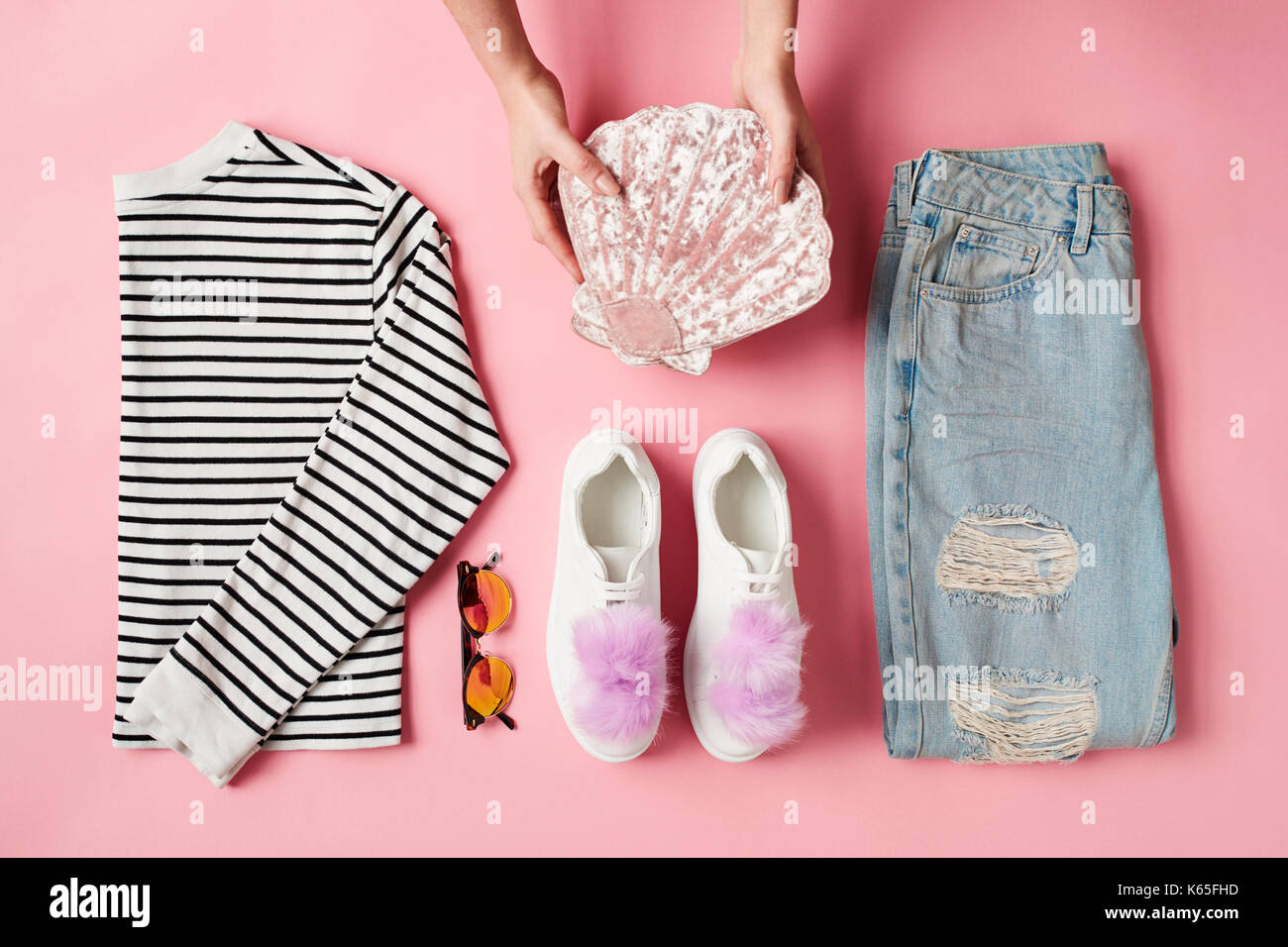 Hands Arranging Flat Lay Female Parisian Style Clothing Stock Photo - Alamy