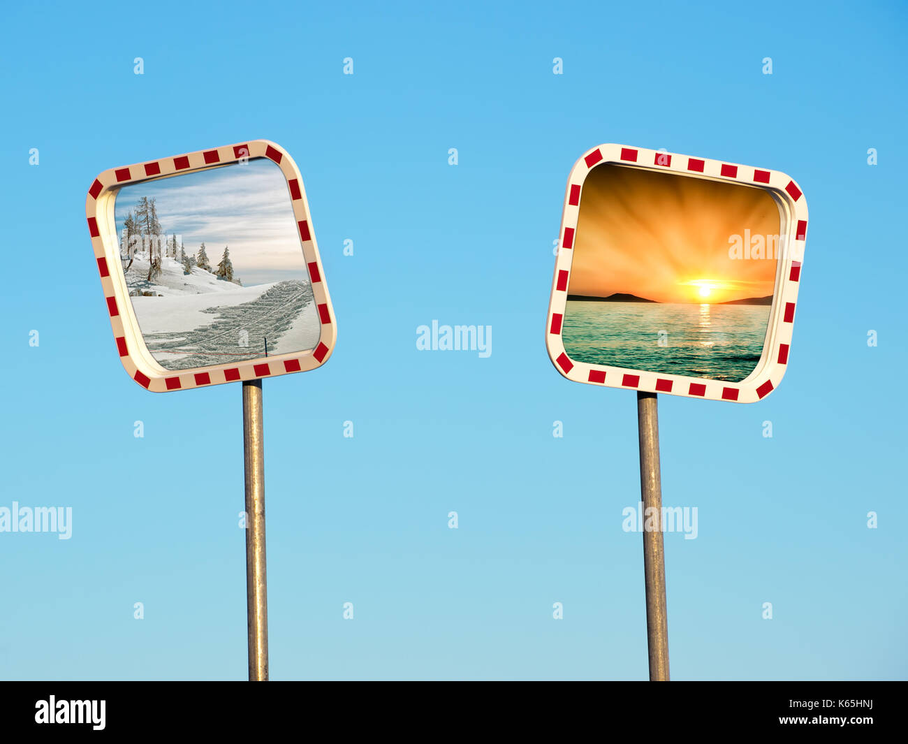 Conceptual image as a choice between winter and summer presented on road mirrors. Stock Photo
