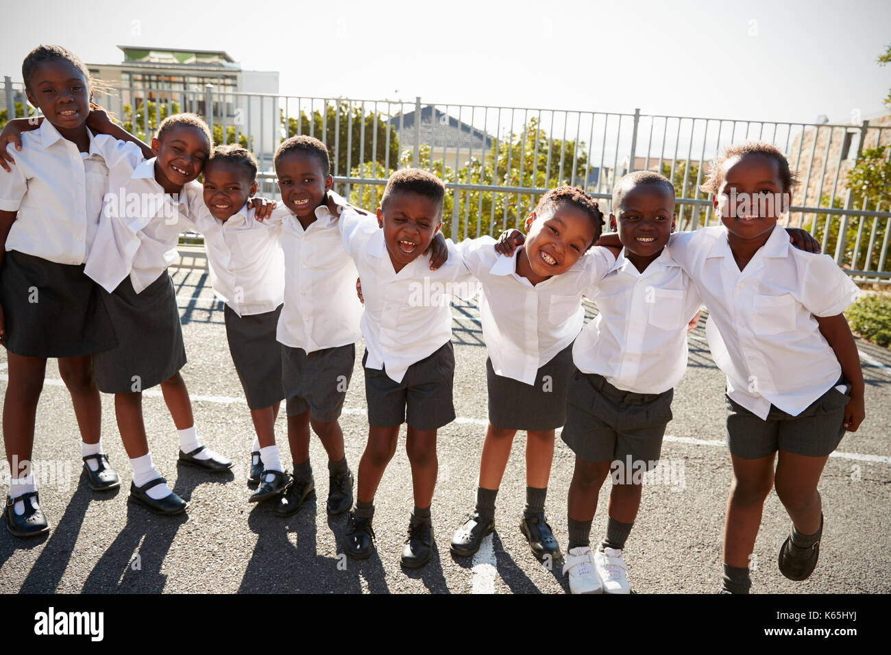 Elementary school kids in Africa posing in school playground Stock