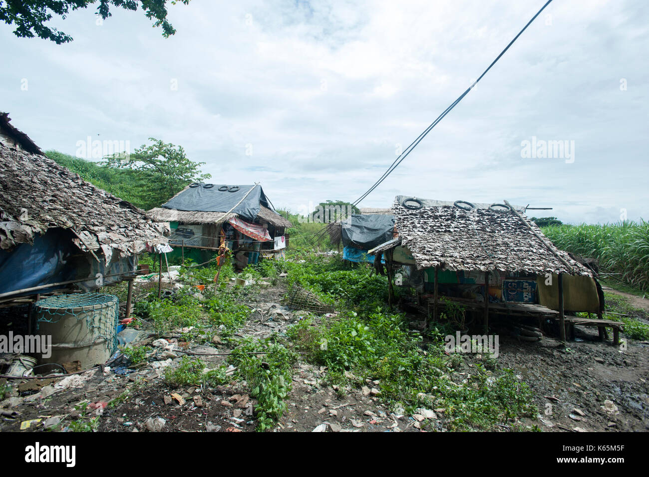 Burmese migrants and refugee community at along side of Garbage Dump in the outskirts of Mae Sot, Thailand. Stock Photo
