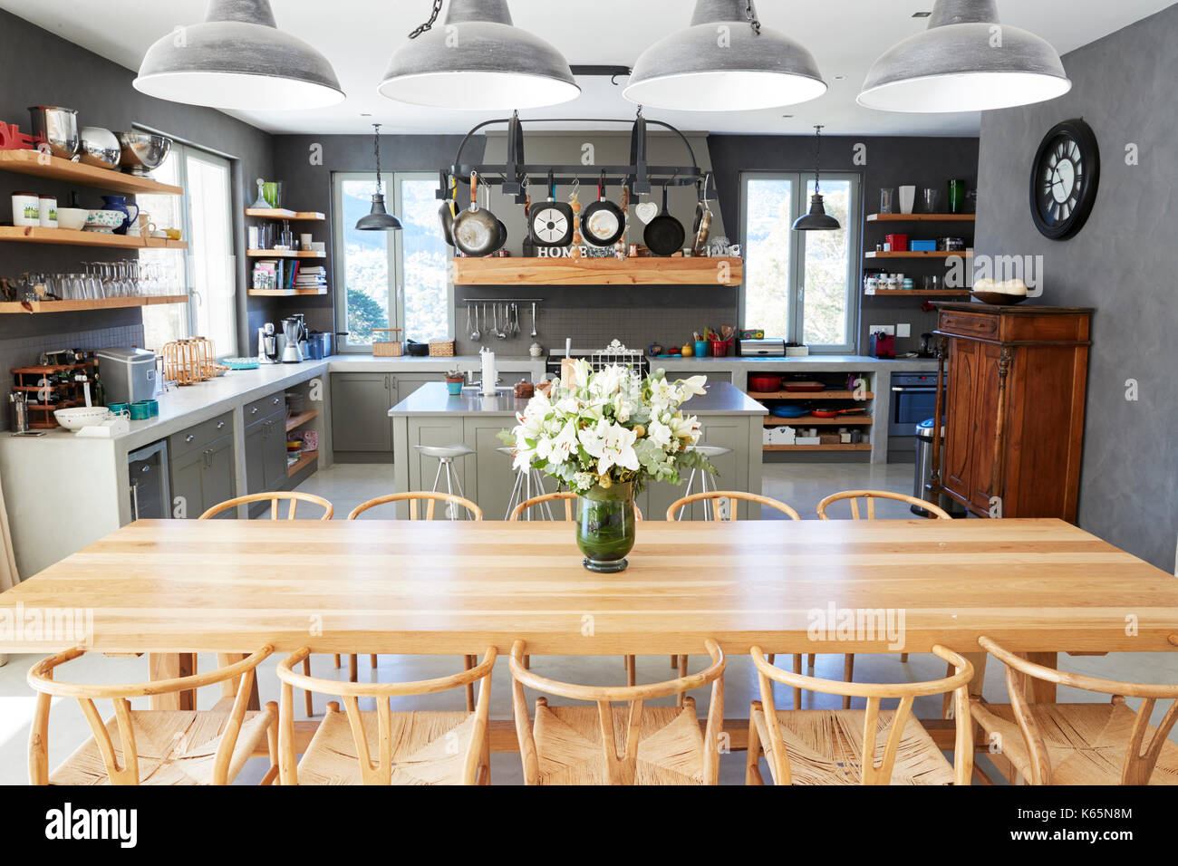 Home Interior With Open Plan Kitchen And Dining Area Stock Photo - Alamy