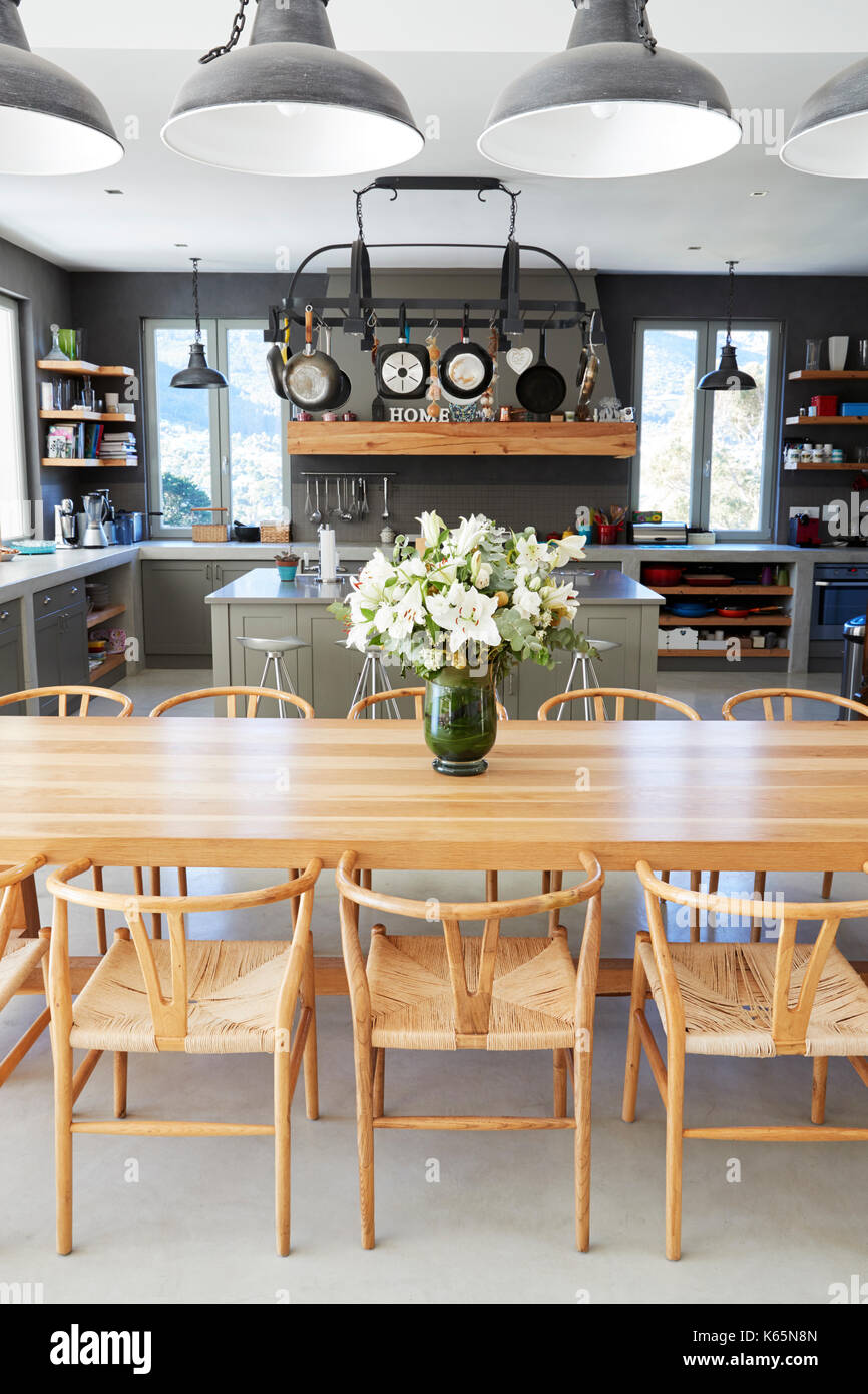 Home Interior With Open Plan Kitchen And Dining Area Stock Photo - Alamy