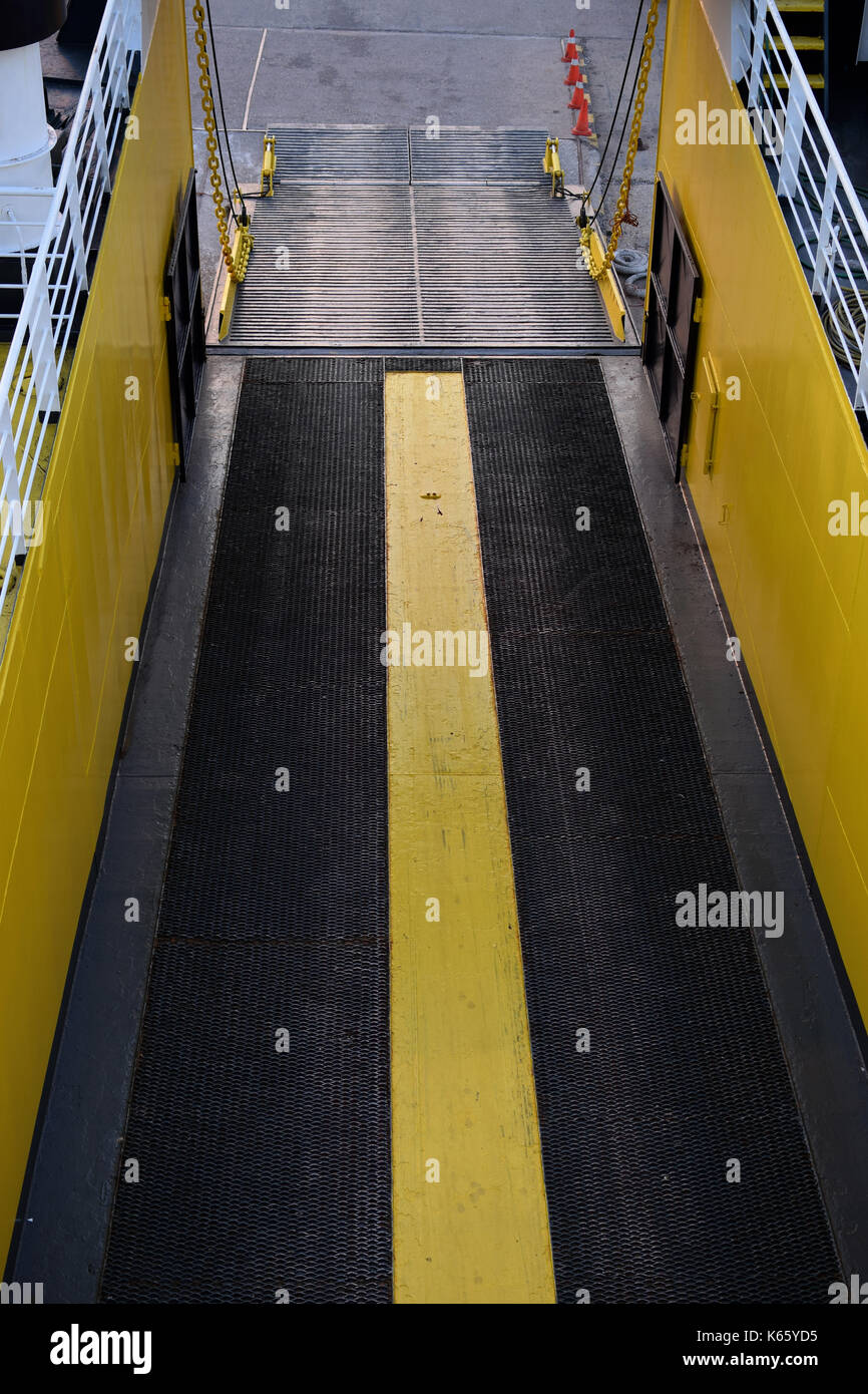 Ferry boat bow visor door hatch and ramp for loading vehicles. Stock Photo