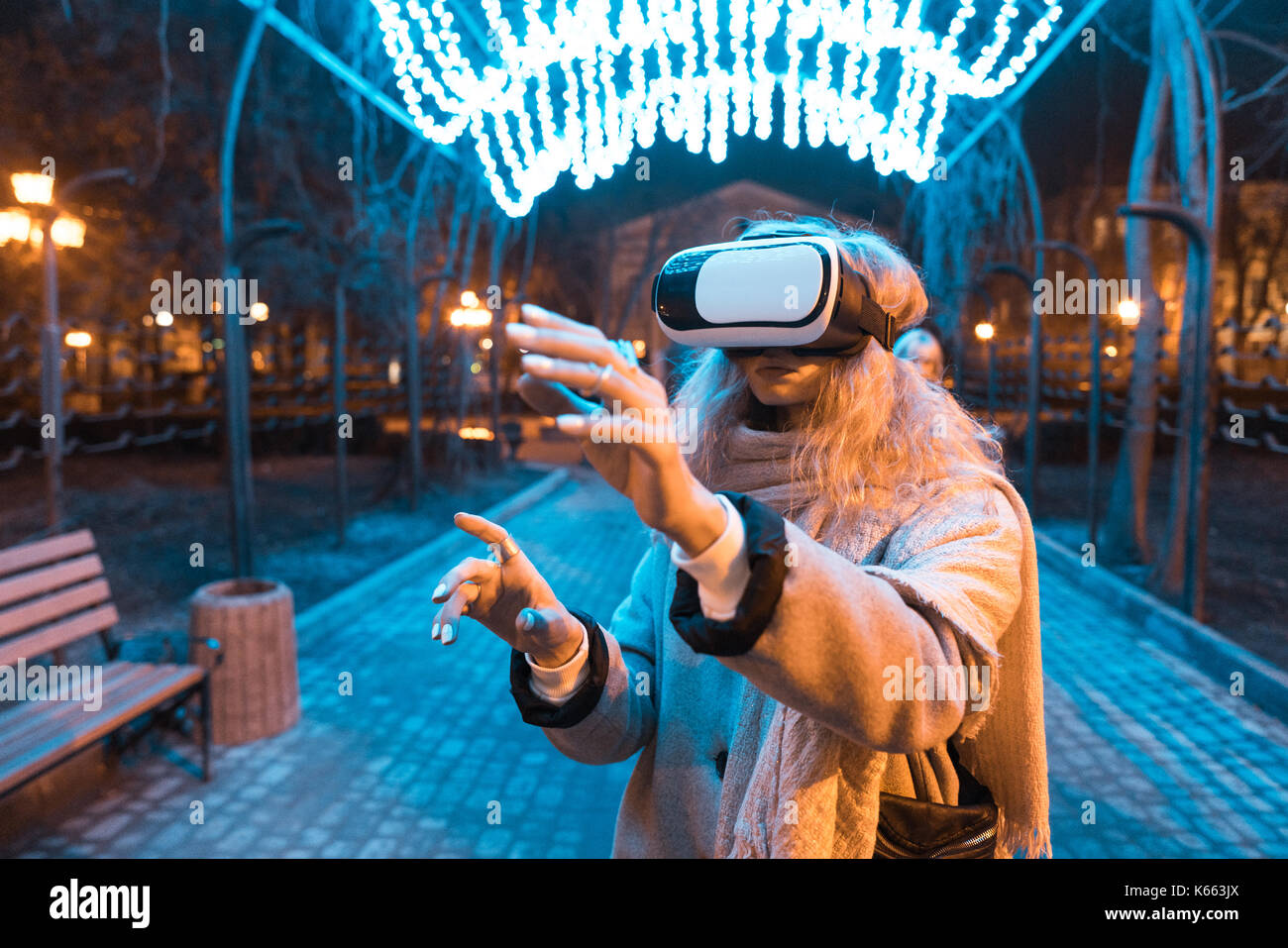 Young girl getting experience VR headset Stock Photo - Alamy