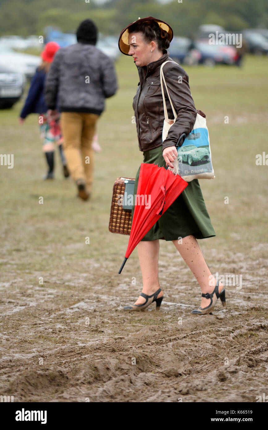 girls walking in mud