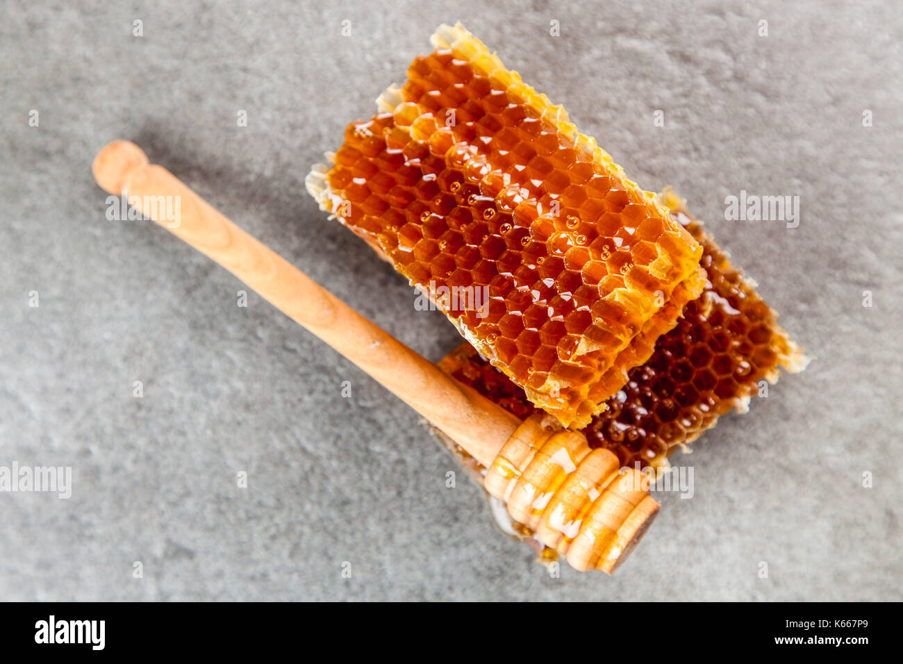 Honeycomb on grey background Stock Photo