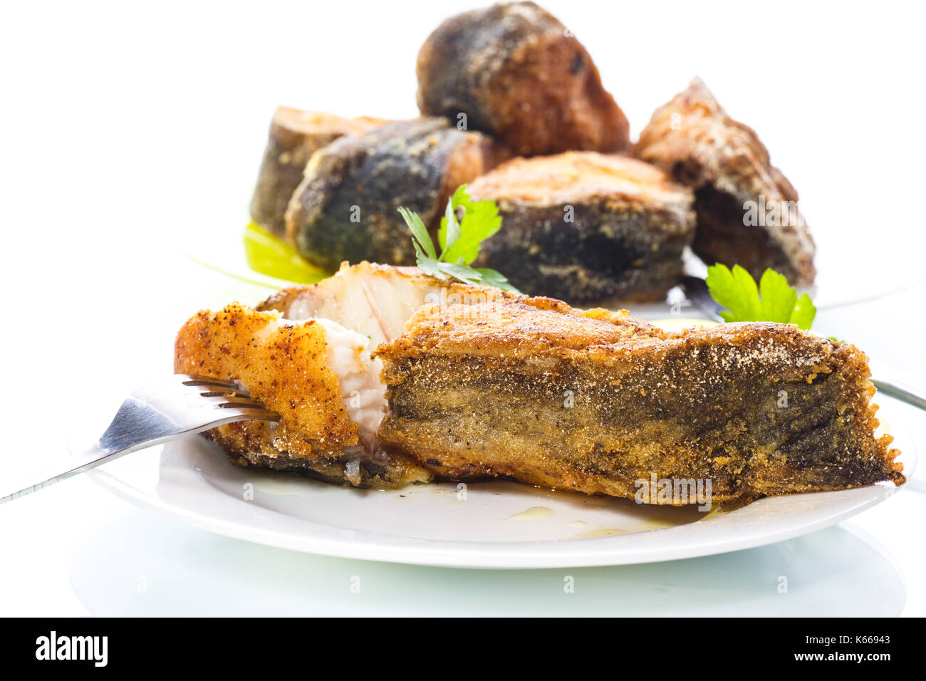 catfish roasted in batter on white background Stock Photo Alamy