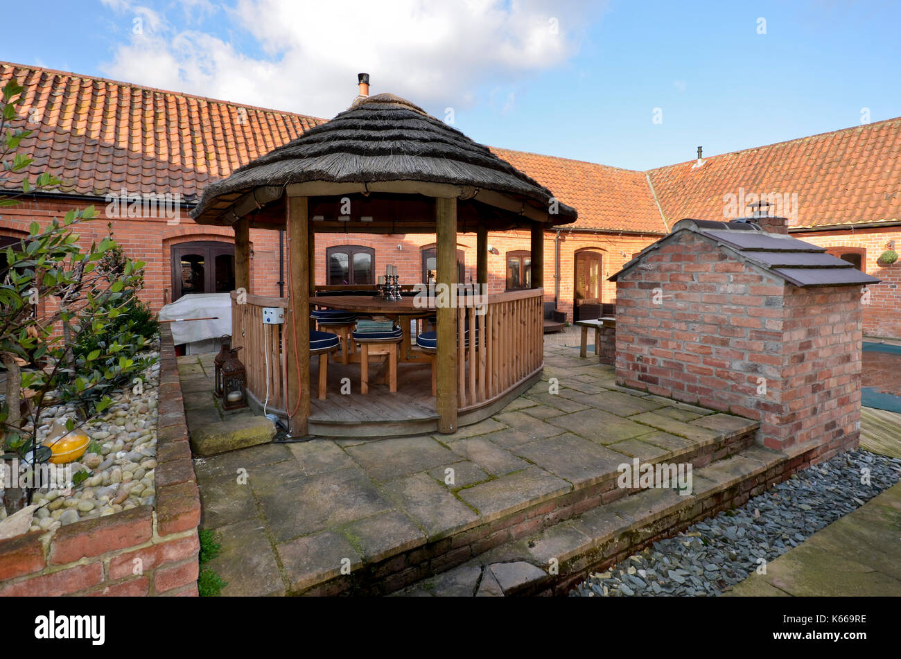 Courtyard with covered seating eating area Stock Photo