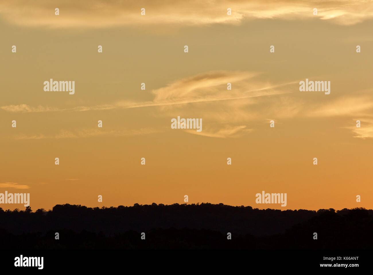 Isolated image of an amazing sunset on a lake Stock Photo - Alamy