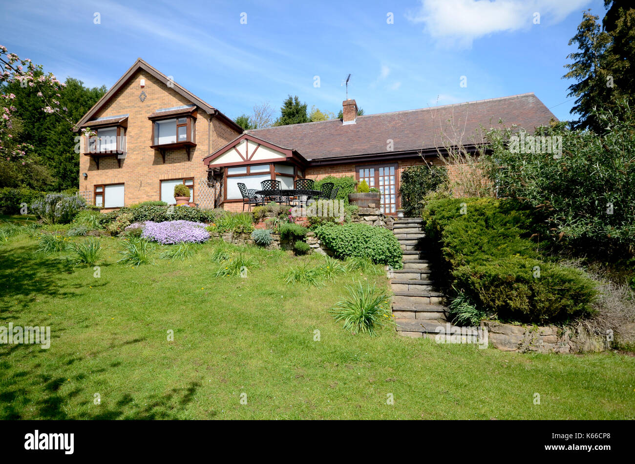 Large extended family house with mature gardens Stock Photo Alamy