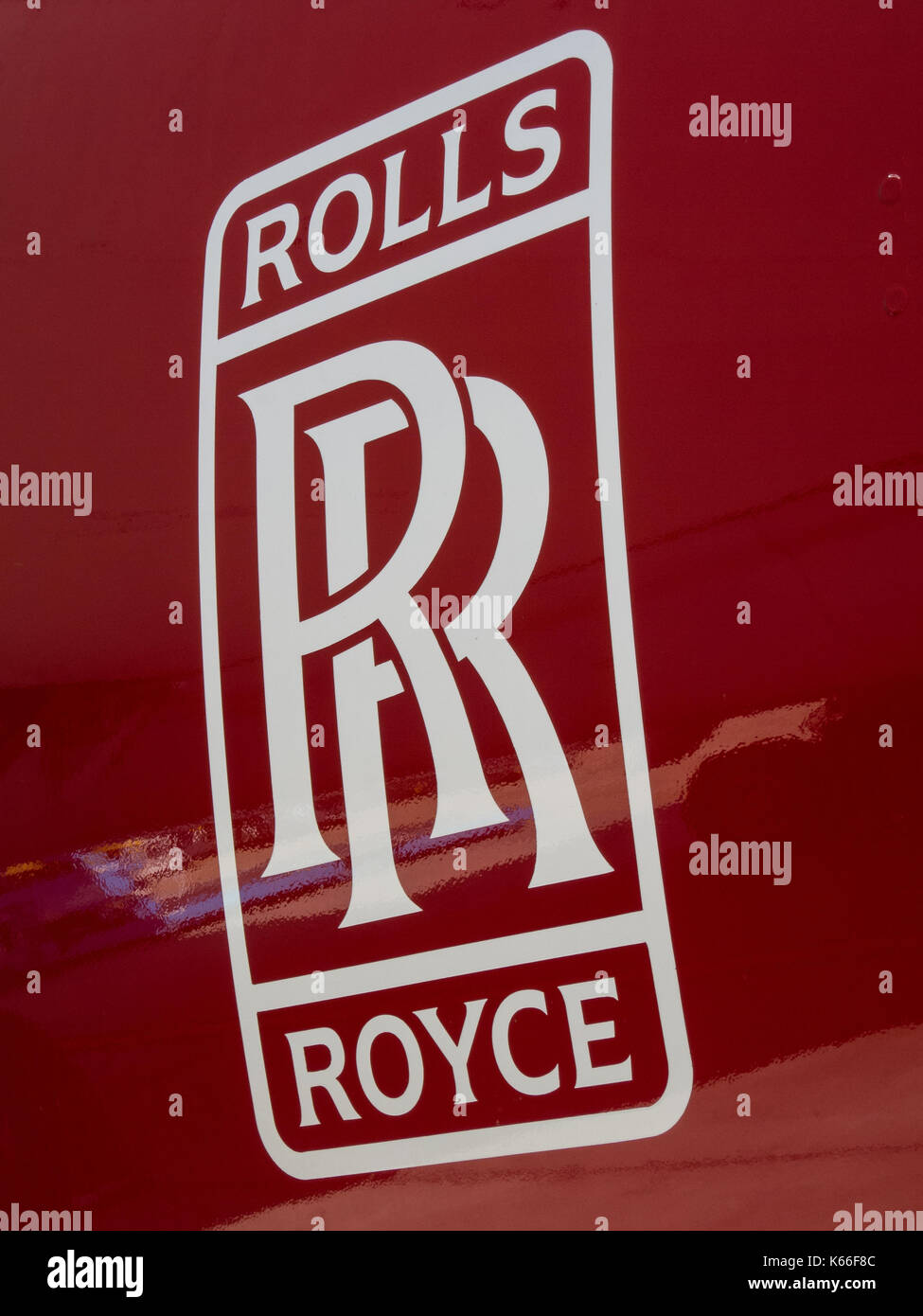 Rolls Royce logo on red aircraft engine Stock Photo