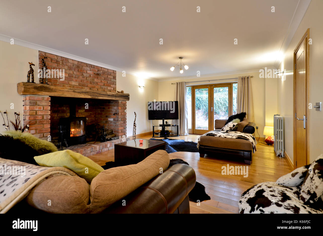 Large fireplace in new build lounge Stock Photo