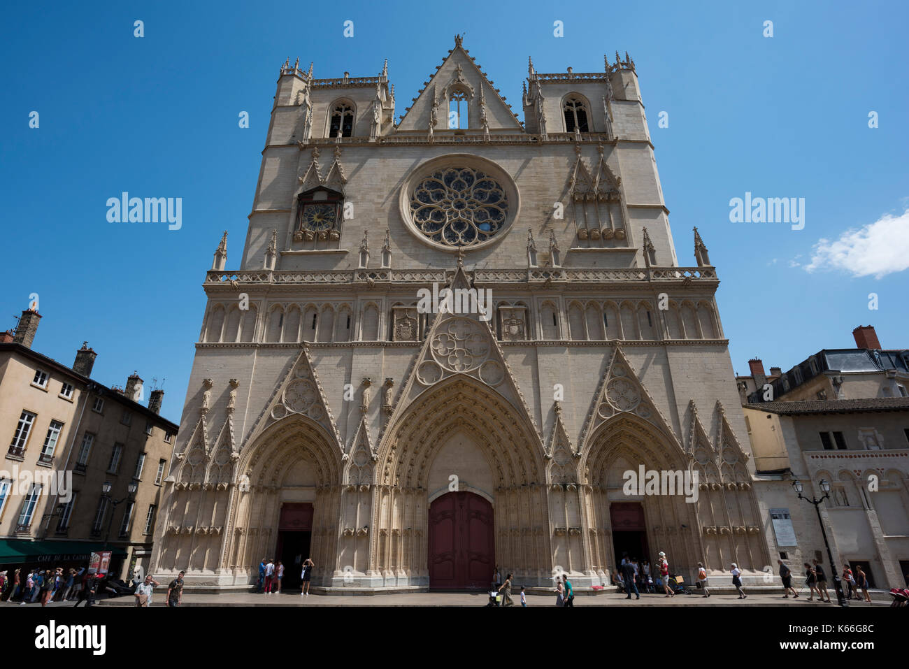 Cathedral Saint-Jean-Baptiste de Lyon with crowd, Roman Catholic church located on Place Saint-Jean in Lyon, France Stock Photo