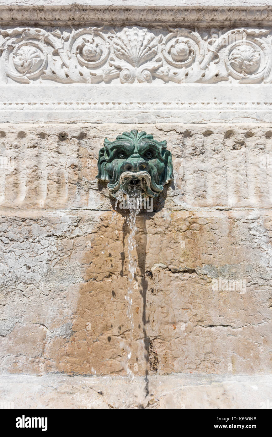 Bronze Lion head of Saint-Jean Fountain, Place Saint-Jean, Lyon, France Stock Photo