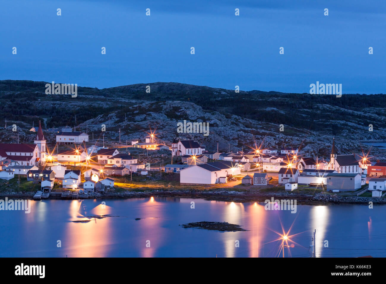 The Town of Fogo on the shores of Fogo Harbour at dusk. Fogo, Fogo