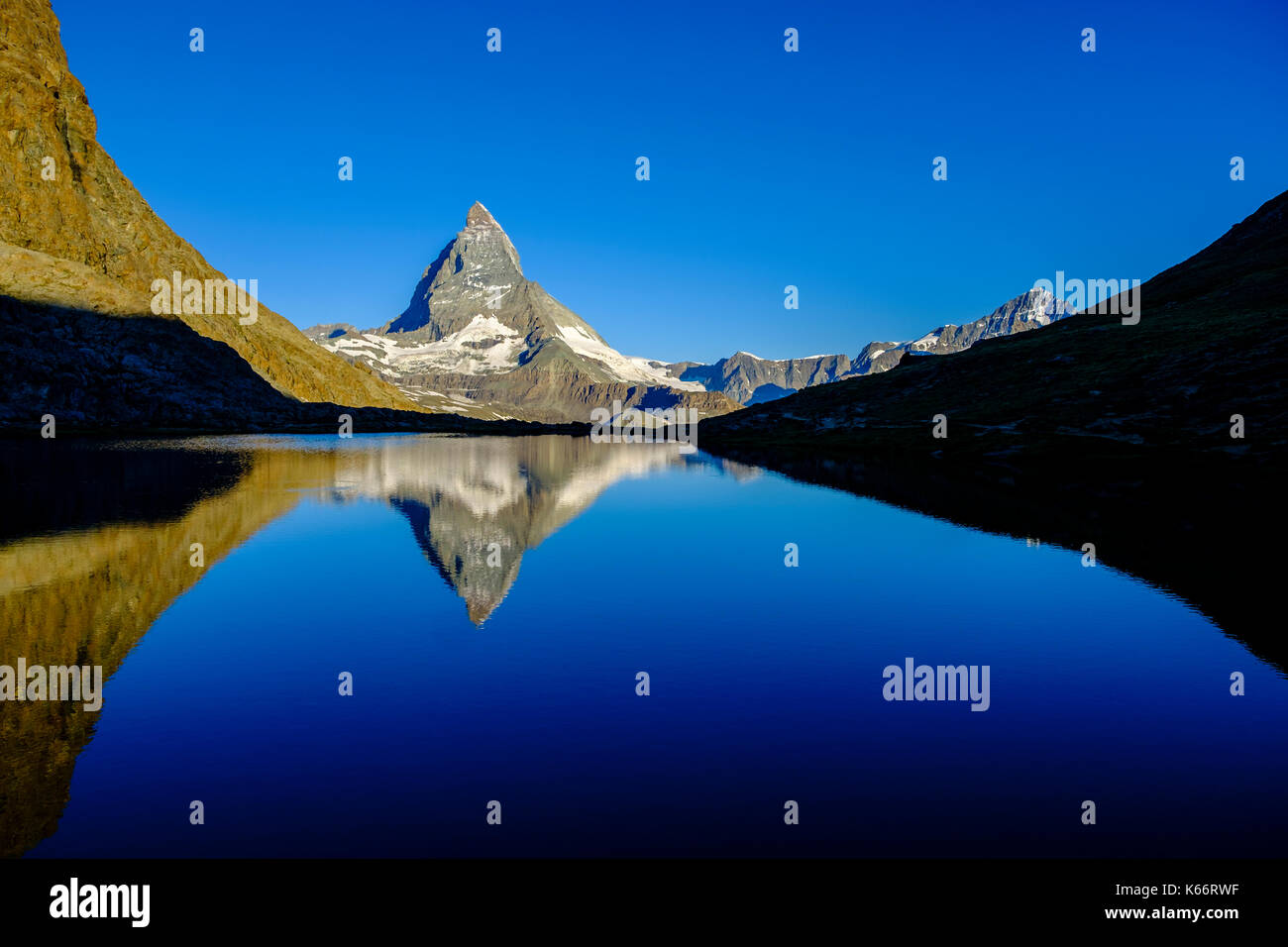 The East Face of the Matterhorn, Monte Cervino, mirroring in the Lake ...