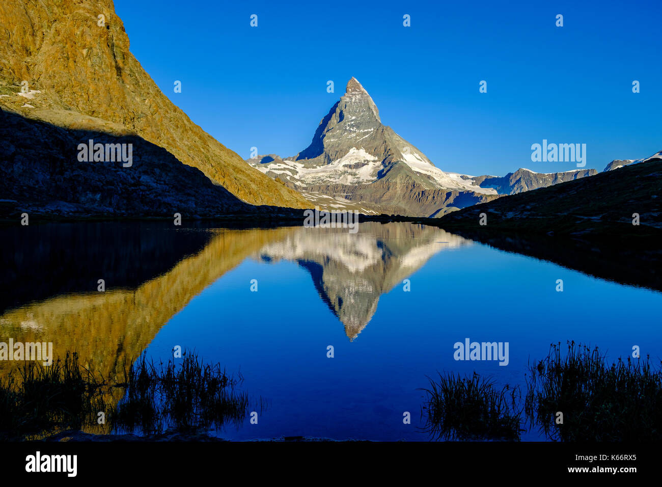 The East Face of the Matterhorn, Monte Cervino, mirroring in the Lake ...