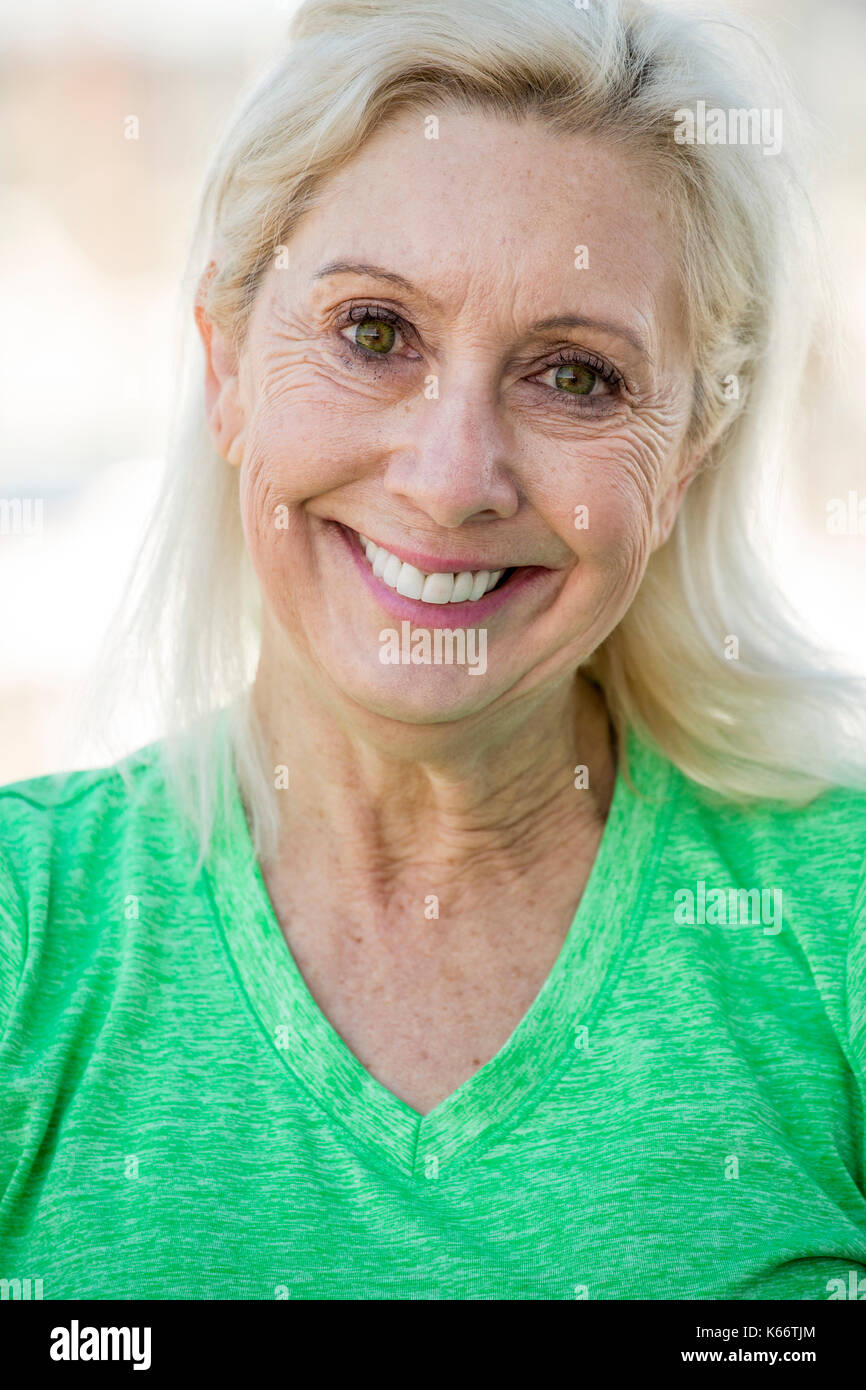 Portrait of smiling Older Caucasian woman Stock Photo