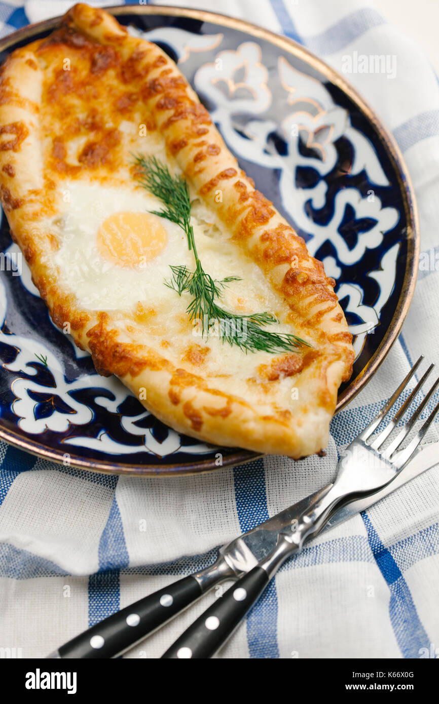 Egg and melted cheese on bread Stock Photo - Alamy