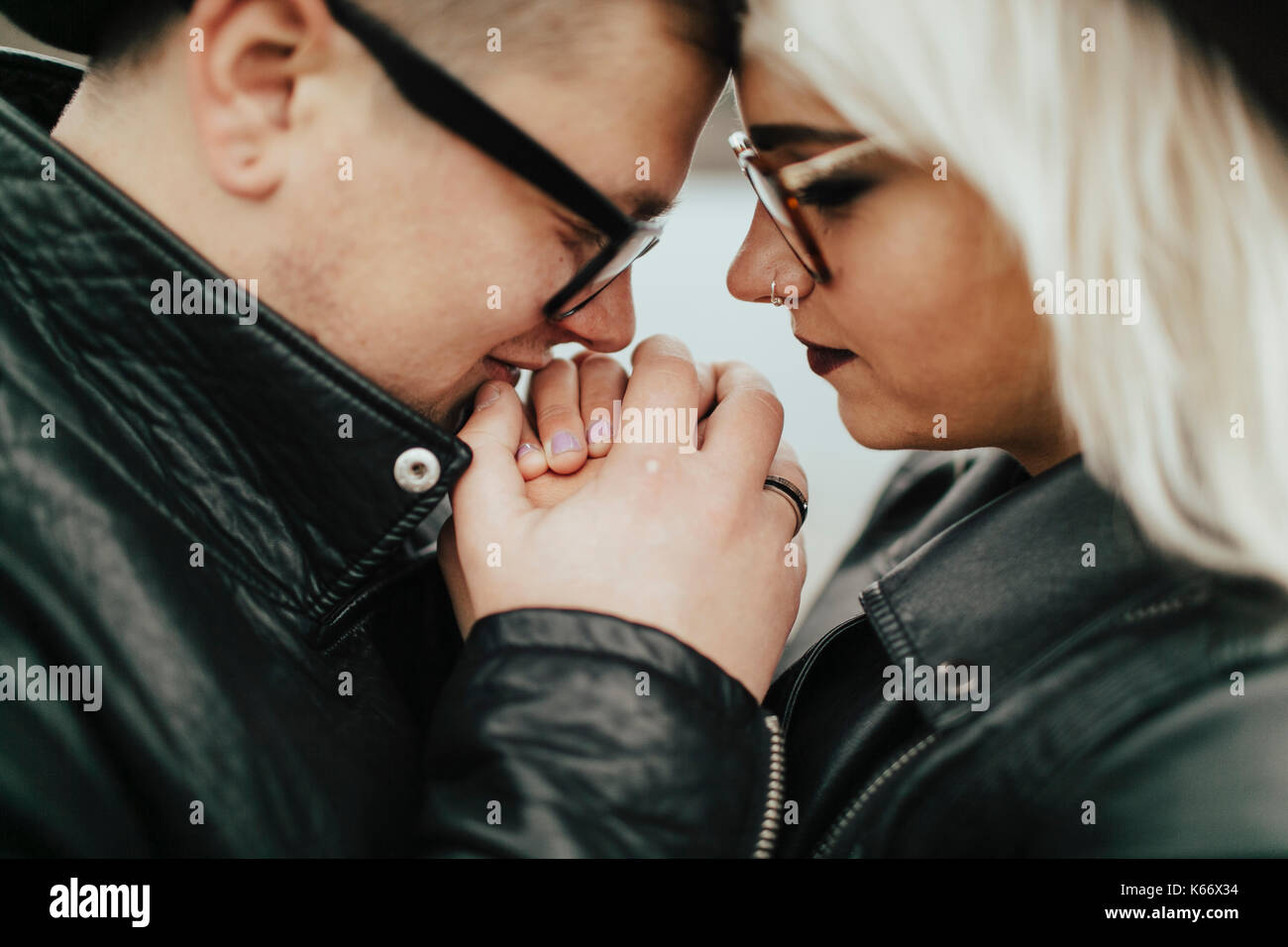 Affectionate Middle Eastern couple holding hands Stock Photo