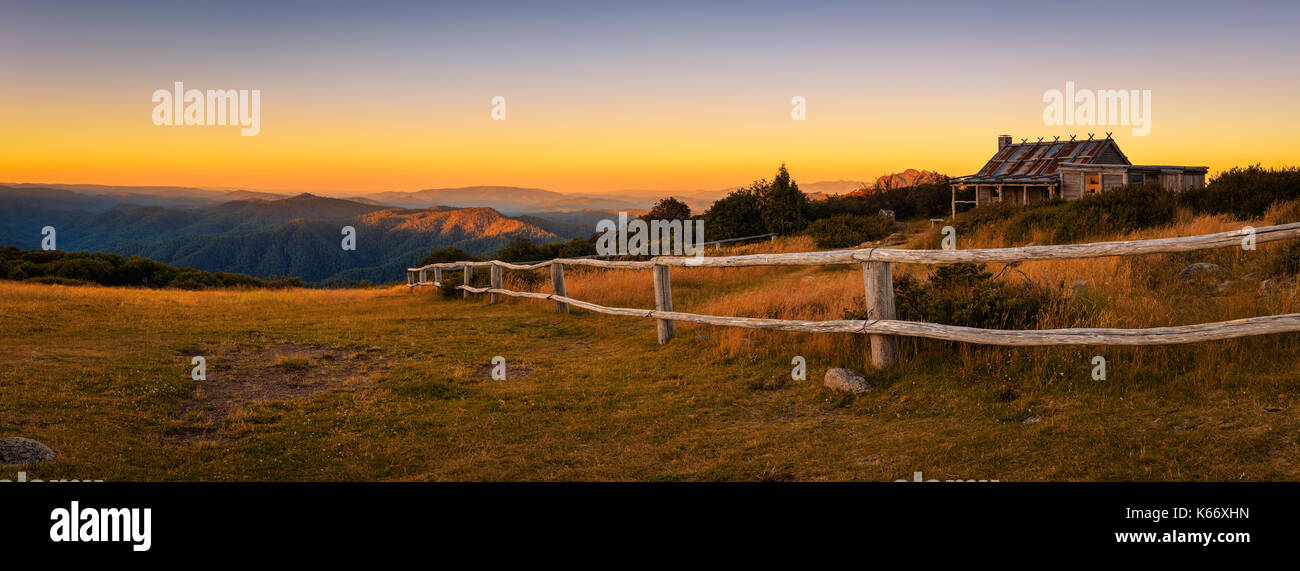 Sunset above Craigs Hut, built as the the set for Man from Snowy River movie in the Victorian Alps, Australia Stock Photo