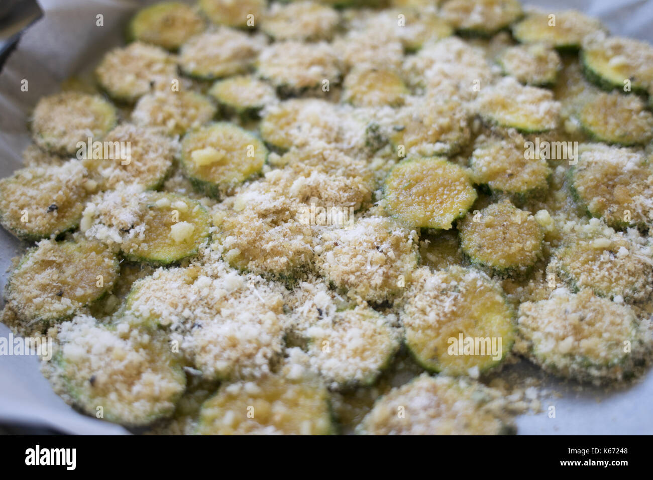 zucchini gratinéèd with parmesan cheese and breadcrumb Stock Photo
