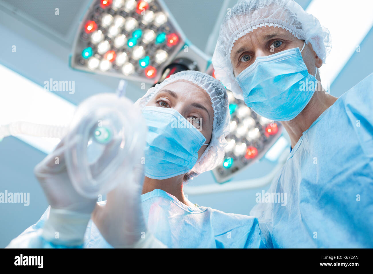 Holding oxygen mask nurse hi-res stock photography and images - Alamy